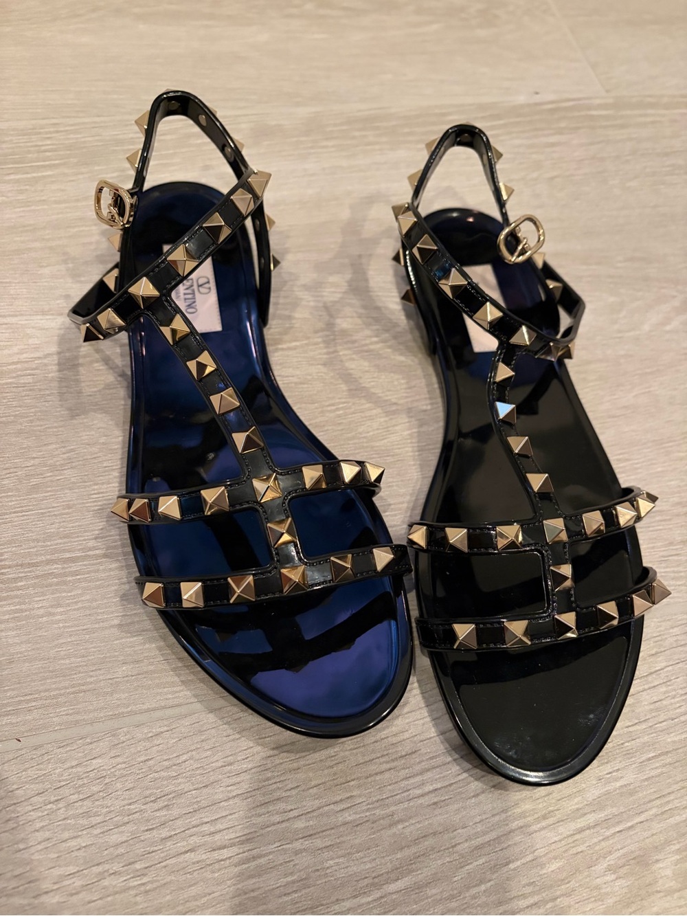 Valentino Garavani Black Patent Leather Rockstud Strappy Sandals with Gold Studs